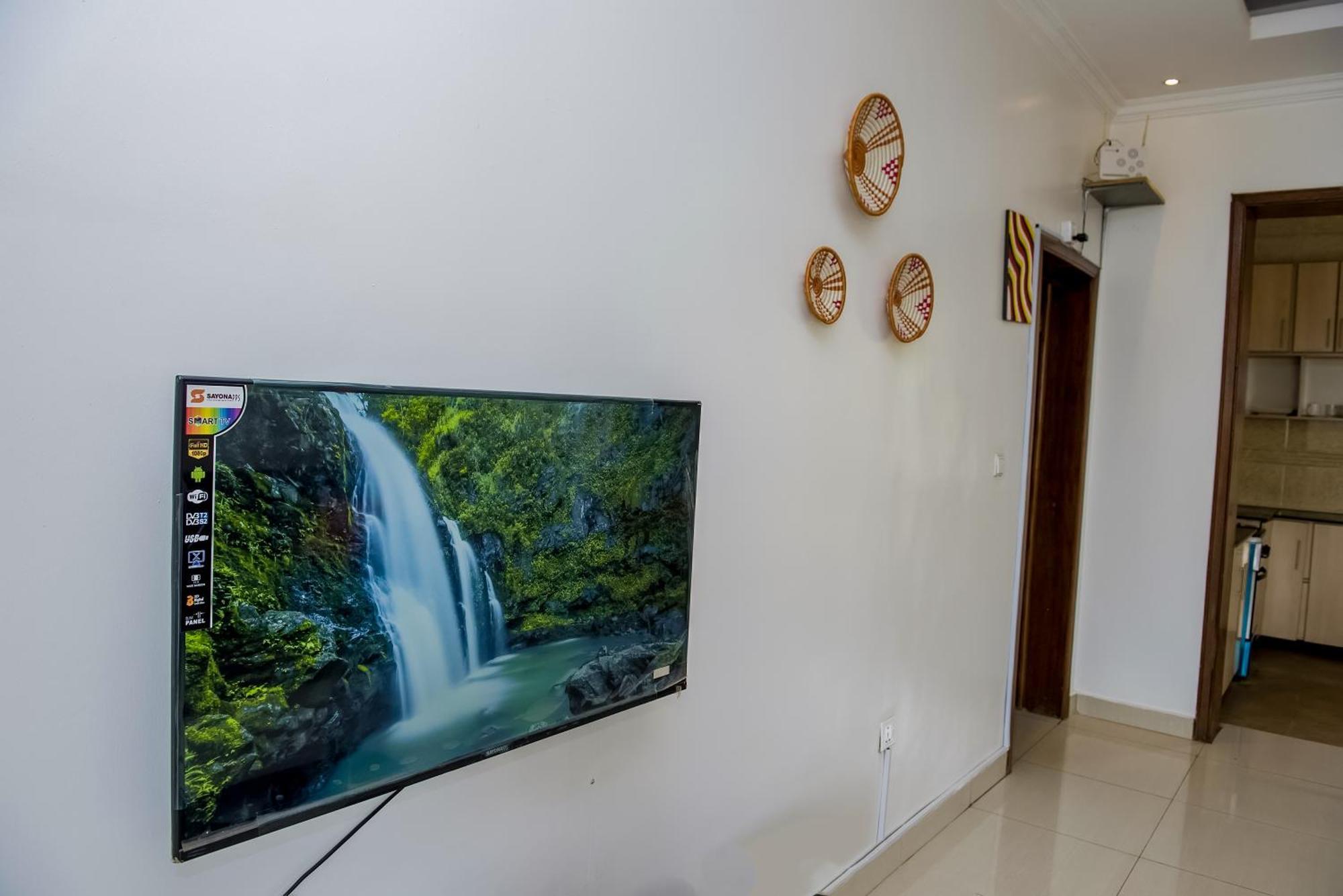 Adriel Homes Apartment Woodland Center Kigali Phòng bức ảnh