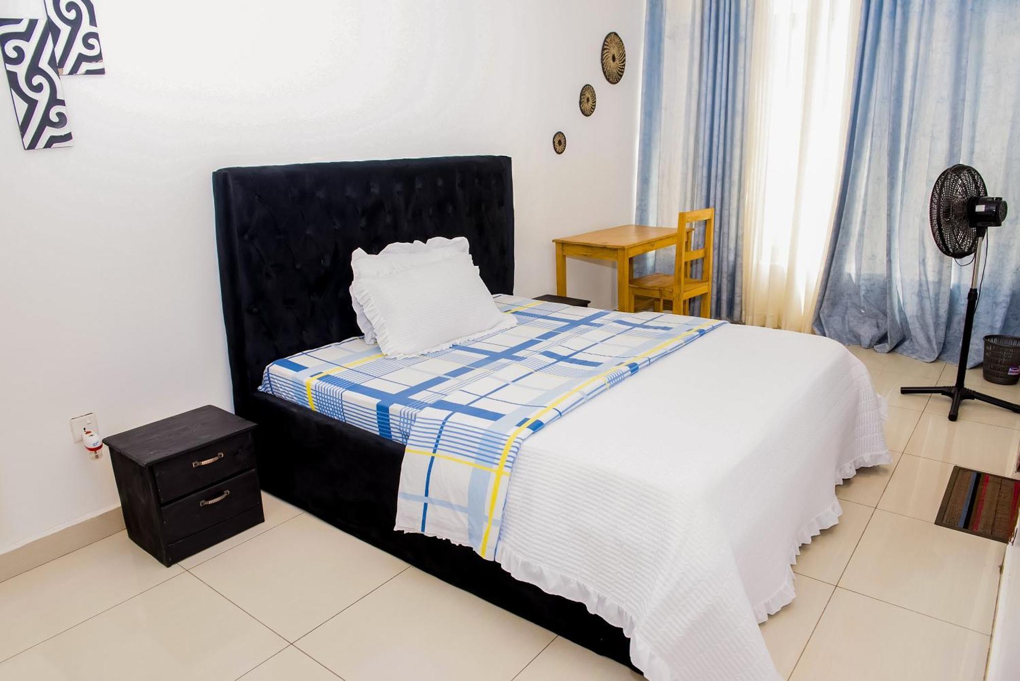 Adriel Homes Apartment Woodland Center Kigali Phòng bức ảnh