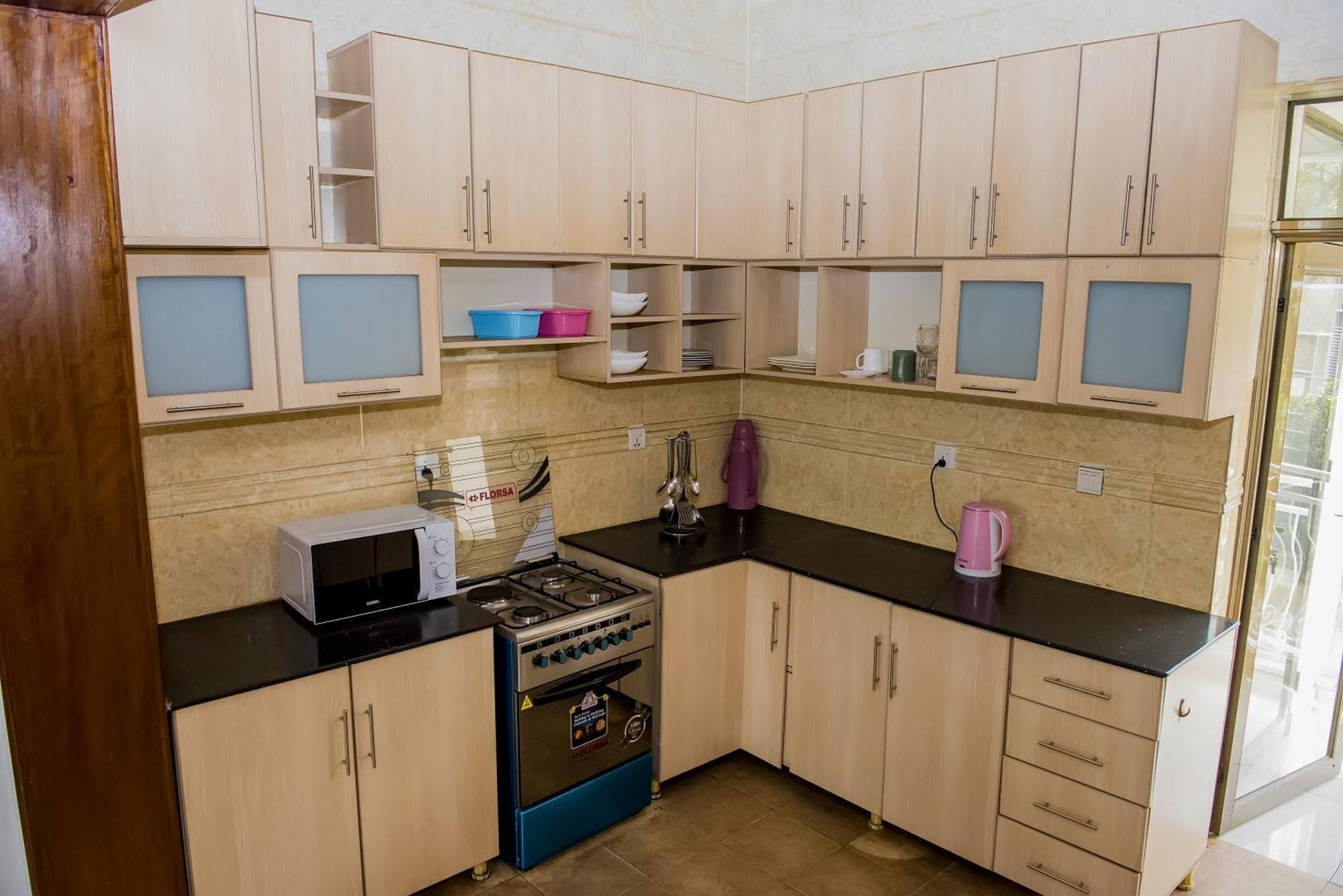 Adriel Homes Apartment Woodland Center Kigali Phòng bức ảnh
